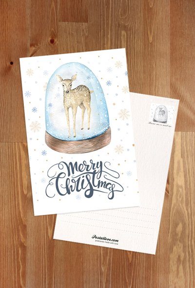 Christmas deer in a crystal ball